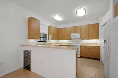 7631 Bristol Cir, Naples, FL 34120 - Photo 11