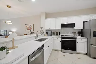 6305 Wilshire Pines Cir #503, Naples, FL 34109 - Photo 9