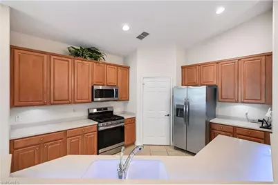 1626 Tarpon Bay Dr S #202, Naples, FL 34119 - Photo 13