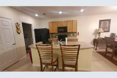 10709 Crossback Ln, Lehigh Acres, FL 33936 - Photo 5