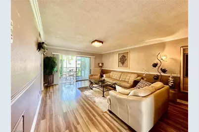 5467 Rattlesnake Hammock Rd #207, Naples, FL 34113 - Photo 1