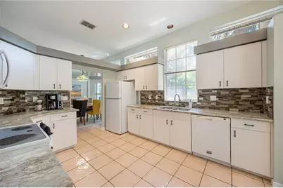 2656 River Reach Dr, Naples, FL 34104 - Photo 7