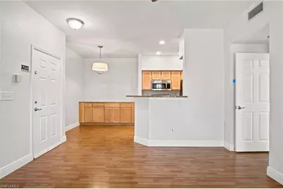 23560 Walden Center Dr #207, Estero, FL 34134 - Photo 1