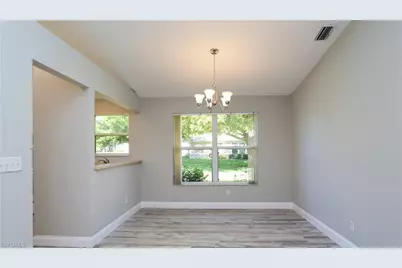 402 Emerald Bay Cir #E7, Naples, FL 34110 - Photo 9