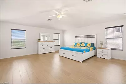 10365 Canal Brook Ln, Lehigh Acres, FL 33936 - Photo 19