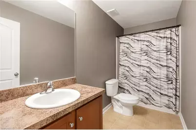 10365 Canal Brook Ln, Lehigh Acres, FL 33936 - Photo 27