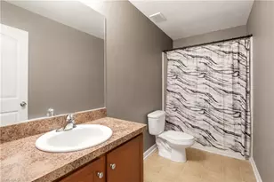 10365 Canal Brook Ln, Lehigh Acres, FL 33936 - Photo 27