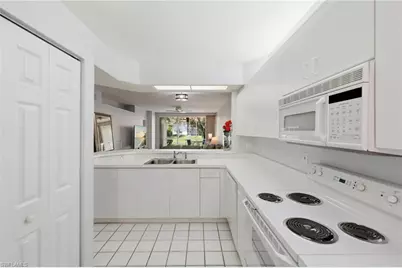 7577 Silver Trumpet Ln #103, Naples, FL 34109 - Photo 13