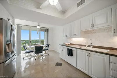7515 Pelican Bay Blvd #10D, Naples, FL 34108 - Photo 29
