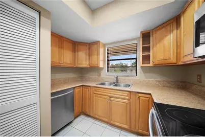 195 Cypress Way E #8, Naples, FL 34110 - Photo 15