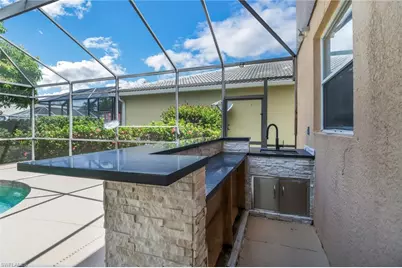 8271 Laurel Lakes Way, Naples, FL 34119 - Photo 5