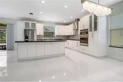 8271 Laurel Lakes Way, Naples, FL 34119 - Photo 9