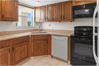 21 High Point Cir E #305, Naples, FL 34103 - Photo 13