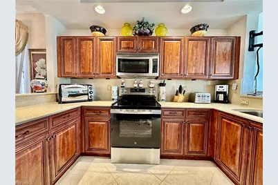 3310 Grand Cypress Dr #101, Naples, FL 34119 - Photo 9