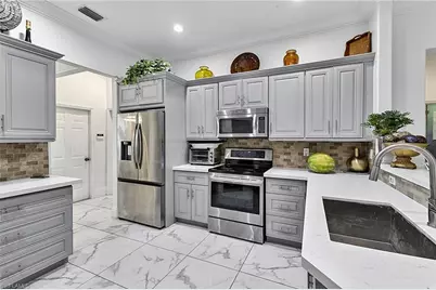1030 21st St SW, Naples, FL 34117 - Photo 23