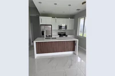 2810 27th St SW, Lehigh Acres, FL 33976 - Photo 3