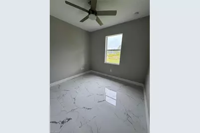 2810 27th St SW, Lehigh Acres, FL 33976 - Photo 9