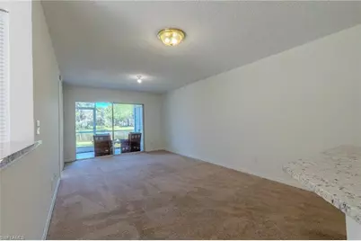 117 Wading Bird Cir #101, Naples, FL 34110 - Photo 1