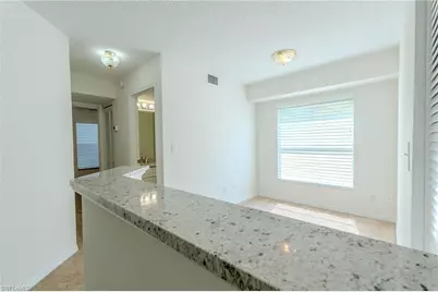 117 Wading Bird Cir #101, Naples, FL 34110 - Photo 13
