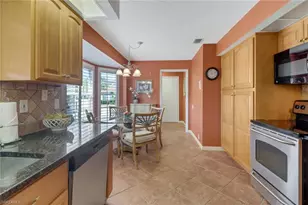 11745 Quail Village Way, Naples, FL 34119 - Photo 13