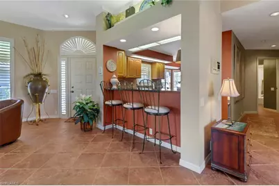 11745 Quail Village Way, Naples, FL 34119 - Photo 9