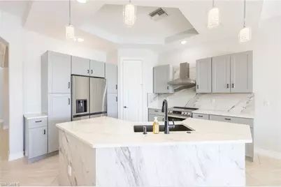 1419 Serrano Cir, Naples, FL 34105 - Photo 7