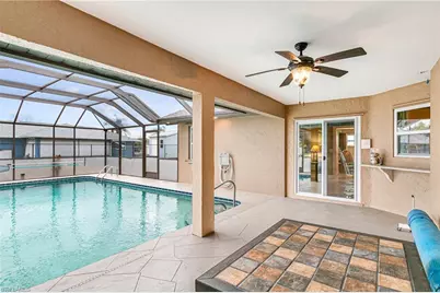401 Candlewick Cir E, Lehigh Acres, FL 33936 - Photo 35