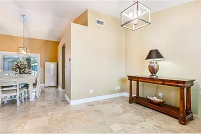 401 Candlewick Cir E, Lehigh Acres, FL 33936 - Photo 25