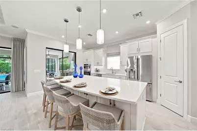 8884 Scarlotti Pl, Naples, FL 34119 - Photo 9