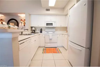 1220 Wildwood Lakes Blvd #201, Naples, FL 34104 - Photo 19