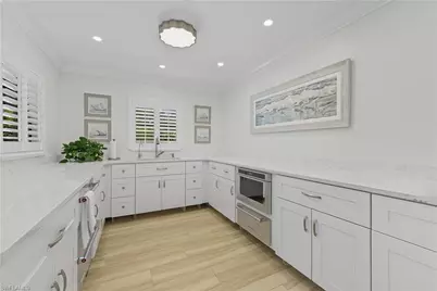 7040 Pelican Bay Blvd #401, Naples, FL 34108 - Photo 35