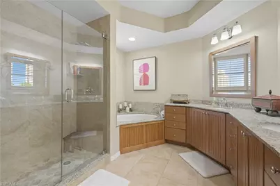 7040 Pelican Bay Blvd #401, Naples, FL 34108 - Photo 31