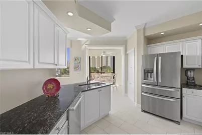 7040 Pelican Bay Blvd #401, Naples, FL 34108 - Photo 17
