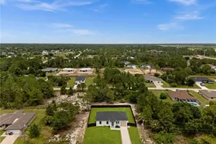 1039 Bassinger Ave S, Lehigh Acres, FL 33974 - Photo 33