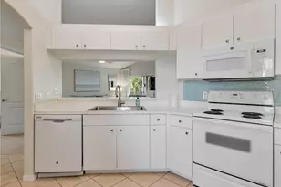 1295 Sweetwater Cove, Naples, FL 34110 - Photo 7