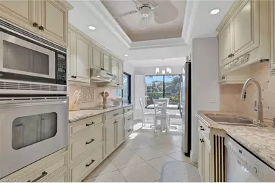 5964 Pelican Bay Blvd #415, Naples, FL 34108 - Photo 1