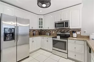 2548 River Reach Dr, Naples, FL 34104 - Photo 9