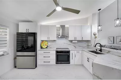 7518 Silver Trumpet Ln #201, Naples, FL 34109 - Photo 11