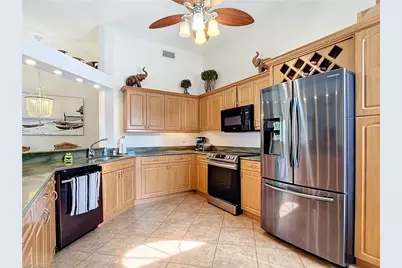 2860 Citrus Lake Dr #R-202, Naples, FL 34109 - Photo 9