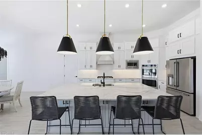 15428 Turin Dr, Naples, FL 34114 - Photo 19