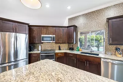 9311 Cedar Creek Dr, Bonita Springs, FL 34135 - Photo 7