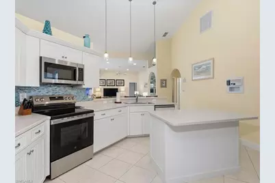 6670 Huntley Ln N, Naples, FL 34104 - Photo 11
