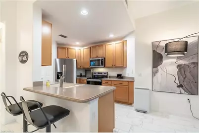 6817 Sterling Greens Dr #102, Naples, FL 34104 - Photo 7