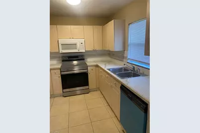 2702 Robin Ave S, Lehigh Acres, FL 33973 - Photo 11