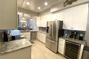 2730 Cypress Trace Circle, Naples, FL 34119 - Photo 5