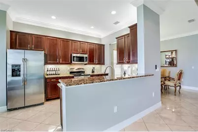 3745 Pleasant Springs Dr, Naples, FL 34119 - Photo 9