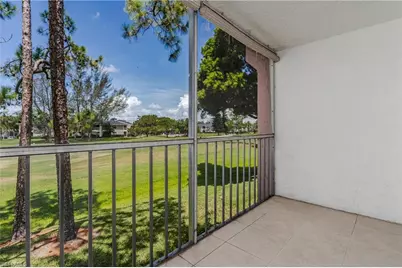 180 Turtle Lake Ct #210, Naples, FL 34105 - Photo 1
