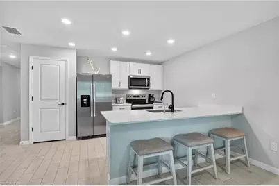 3013 41st St SW, Lehigh Acres, FL 33976 - Photo 9