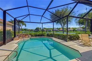 9097 Troon Lakes Dr, Naples, FL 34109 - Photo 1