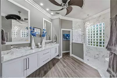 9097 Troon Lakes Dr, Naples, FL 34109 - Photo 15